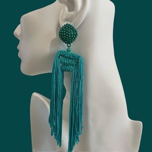 TQTA “The Statement” Tassel Earrings In Turquoise.